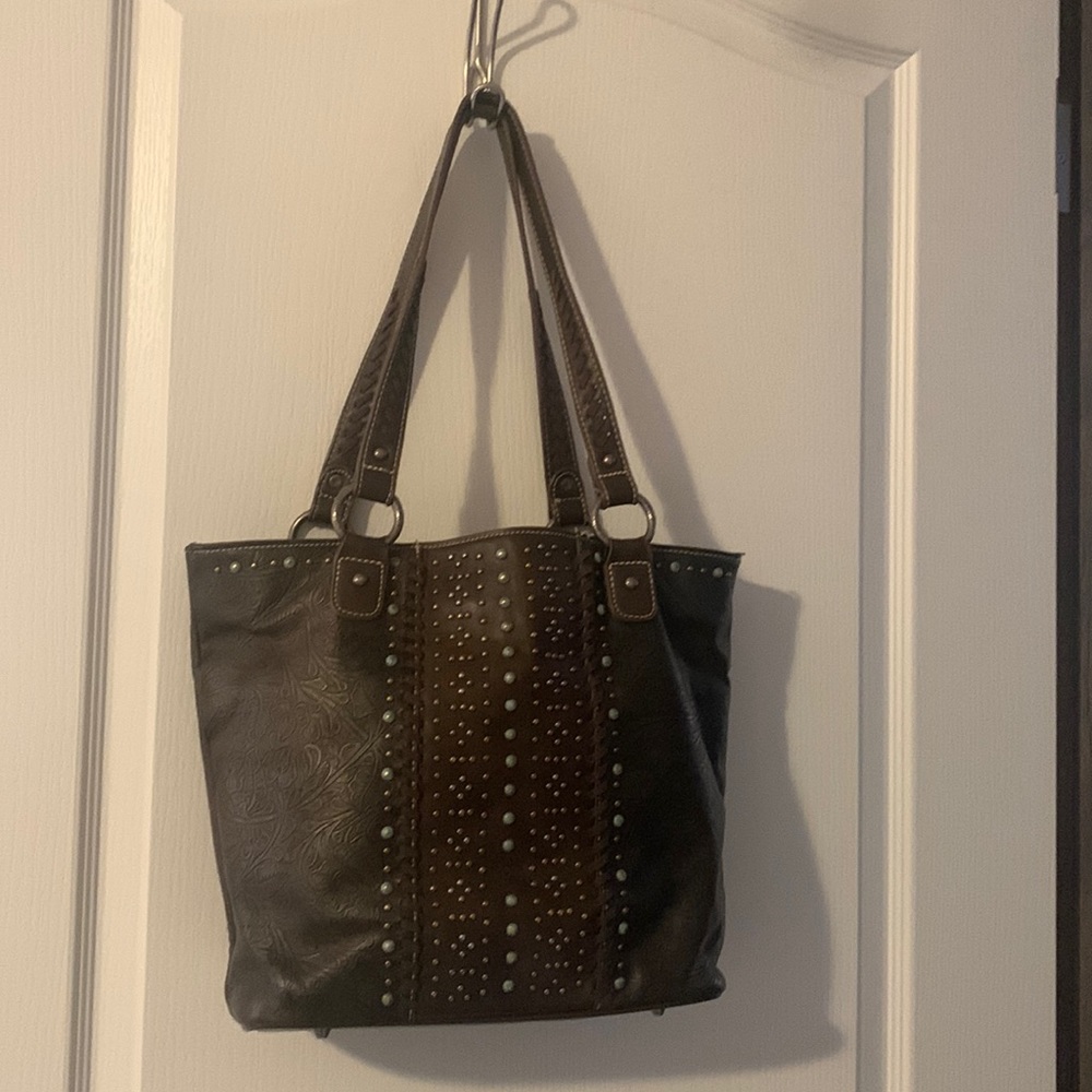 Montana West Purse, gently used, has a few flaws that are pictured